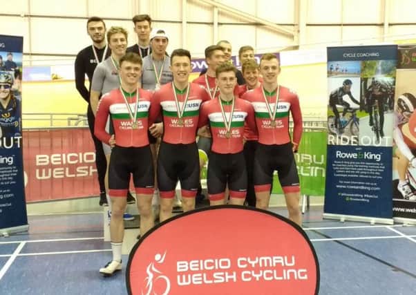 Brendan Drewett, Alex Collins, Harvey McNaughton and Thomas Key sporting the south region's grey and black colours on the podium in Wales