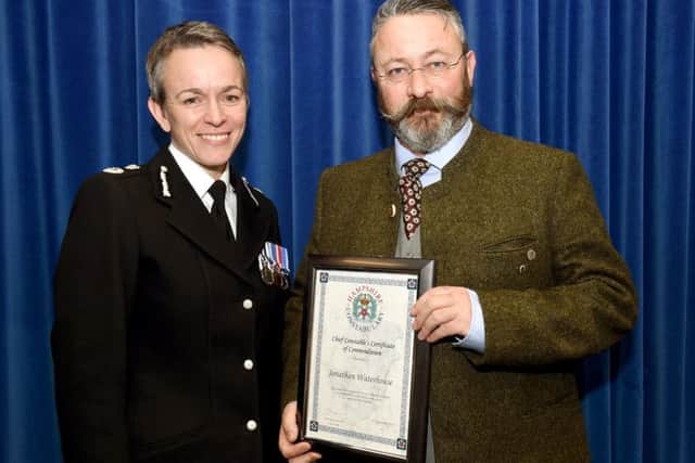 Jonathan Waterhouse is presented with his bravery award by chief constabel Olivia Pinkney Picture: Jan Brayley