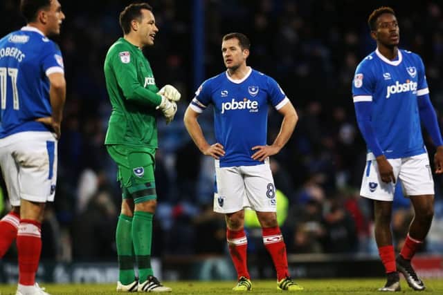 The Pompey players at the final whistle following yesterday's defeat against Exeter Picture: Joe Pepler