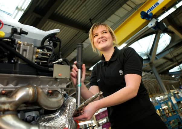 Sophie Moore, an assembly apprentice, at Rolls-Royce Motor Cars in Goodwood, West Sussex