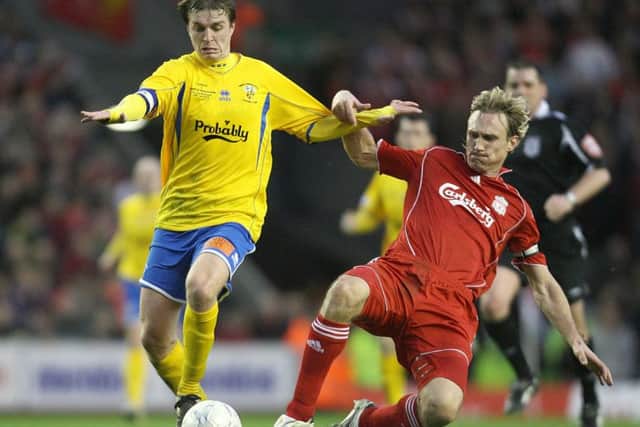 Former Hawks skipper Jamie Collins in Anfield action in January 2008 - with the non-league underdogs beaten 5-2 by Liverpool after twice leading their Premier League opponents