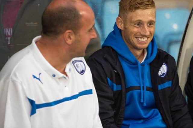 Paul Cook and Eoin Doyle have reunited at Fratton Park