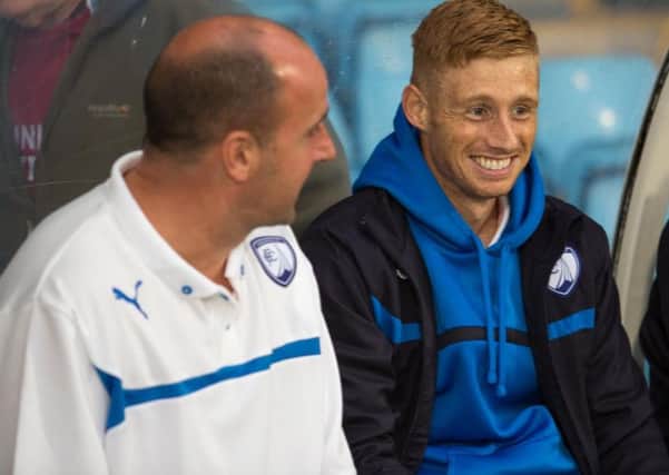 Paul Cook and Eoin Doyle have reunited at Fratton Park
