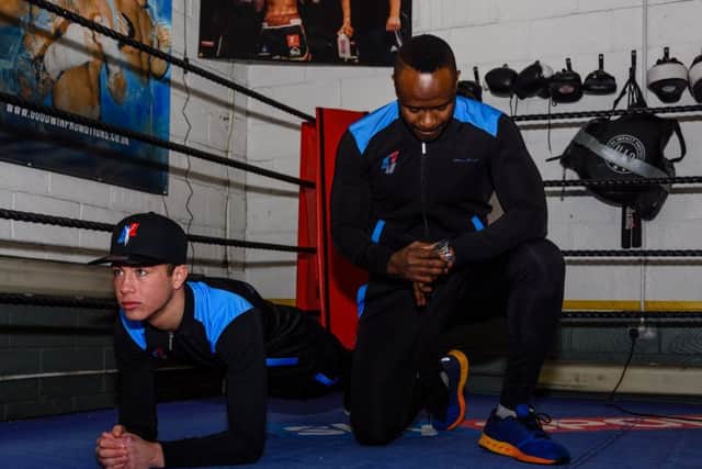 Lucas Ballingall with his Fitness For Life sponsor, personal trainer Warren Chebby. Picture: John Ackerley