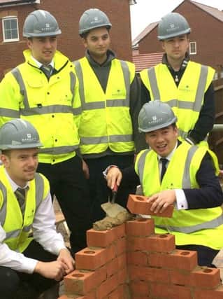 Alan Mak (front right) poses with Barratt Homes apprentices, who will be at the event