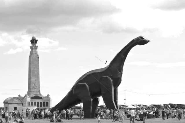 Luna Park by Heather and Ivan Morison - the dinosaur artwork that was placed on Southsea Common on 2010 and burned down due to an electrical fault. The artists will be contributing to the silent online auction for Aspex Gallery