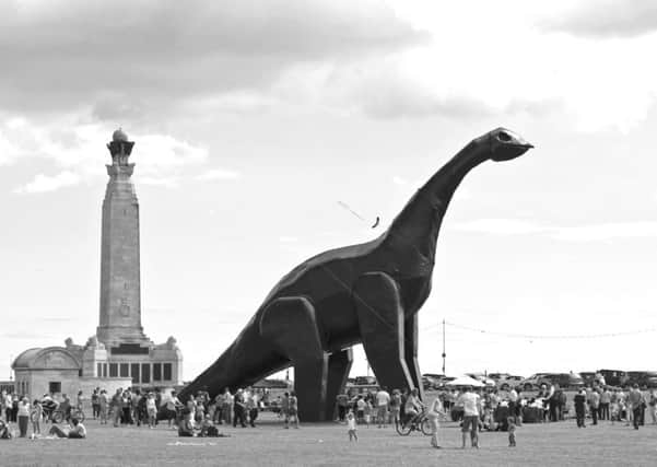 Luna Park by Heather and Ivan Morison - the dinosaur artwork that was placed on Southsea Common on 2010 and burned down due to an electrical fault. The artists will be contributing to the silent online auction for Aspex Gallery