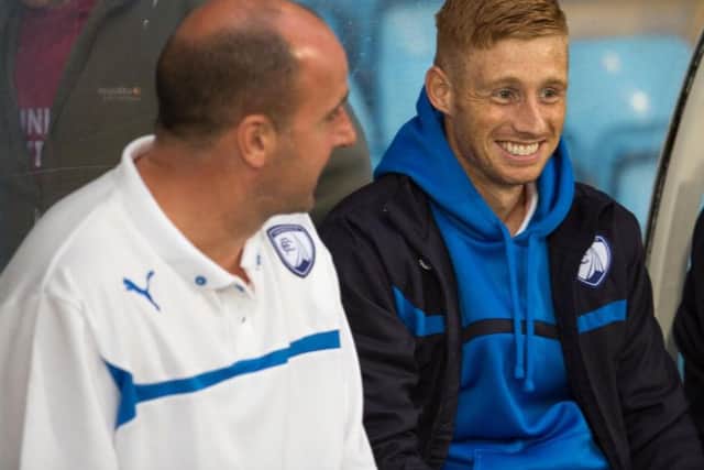Eoin Doyle, right, has reunited with Pompey boss Paul Cook