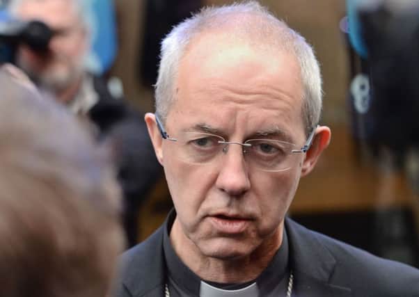 The Archbishop of Canterbury Justin Welby speaks to the media after he appeared on breakfast presenter Nick Ferrari's LBC show at the Global Radio studios in London.
Picture: Victoria Jones/PA Wire