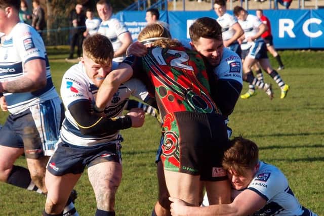 Royal Navy Rugby League and Myton Warriors in action
