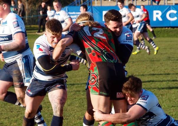 Royal Navy Rugby League and Myton Warriors in action