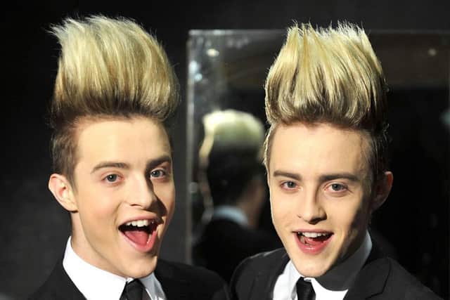 This undated handout photo released by  Channel 5 and taken in an unknown location shows Jedward - John and Edward Grimes,   contestants in the 'Celebrity - Big Brother 2011' which commences at Elstree Studios, in London, Thursday, Aug 18, 2011. (AP Photo / Channel 5, Jon Cogill) EDITORIAL USE ONLY ENGSUS00320130923093053