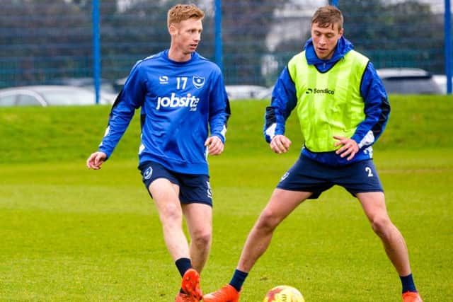 New Pompey striker Eoin Doyle, left, with Tom Davies in training Picture: Colin Farmery
