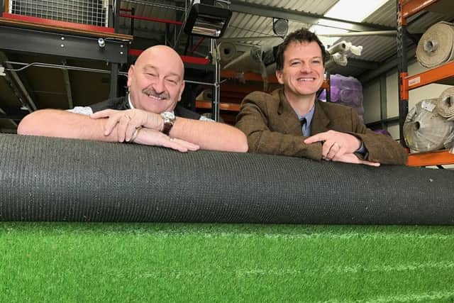 Portsmouth Flooring owner Alan Cobb, left, with Russell Mogridge of commercial property consultancy Hughes Ellard at Portsmouth Floorings new trade counter in Portsmouth