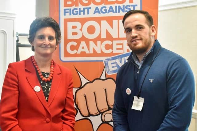 Flick Drummond with former bone cancer patient Jamie Wood