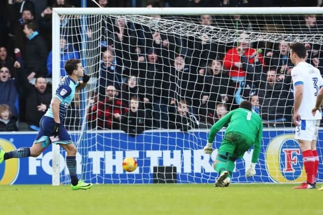 Scott Kashket celebrates his winner for Wycombe Picture: Joe Pepler