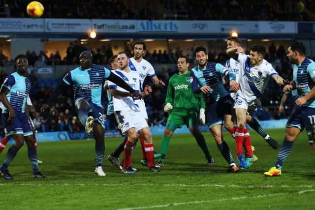 Pompey sent keeper David Forde forward yesterday in the dying seconds as they attempted to rescue a point against Wycombe Picture: Joe Pepler