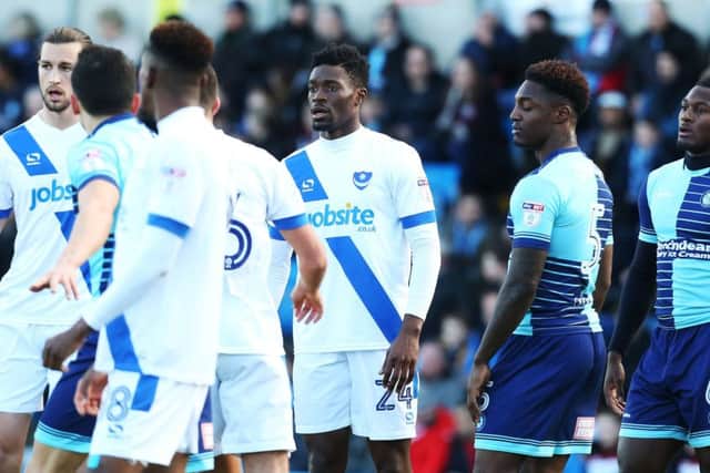 Pompey midfielder Amine Linganzi, centre      Picture: Joe Pepler