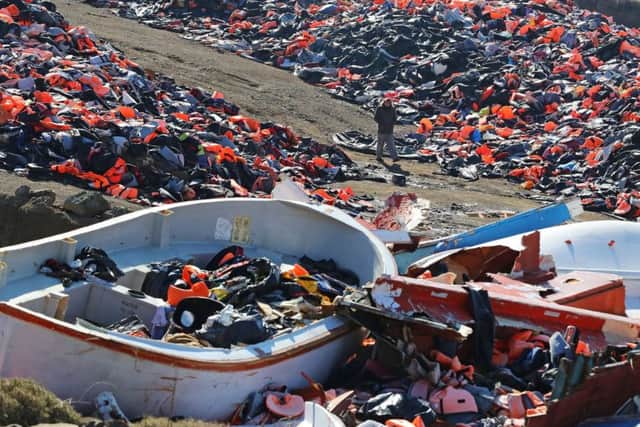 British expatriate Eric Kempson, who is battling to save lives on the Greek island of Lesbos, walks between piles of used life jackets, which he said the majority of which are fake and include at least 150,000 vests, half of the original amount that began to accumulate after long trips to the main tip became unsustainable owing to the large influx of refugees and subsequent life jackets, located on the island close to his home in Eftalou, where the 61-year-old warned the refugee crisis is far from over.
Picture: Owen Humphreys/PA Wire