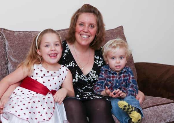 Kim Bradshaw with her children, Olivia, seven, and Eli, two. Picture: Habibur Rahman