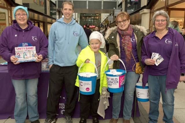 Volunteers for Cancer Reasearch UK, from left, Sarah Porter, Alex Newton, Jasper Whitworth, six, Maxine Kirk and Jayne Bowater Picture: Keith Woodland (170194-009)