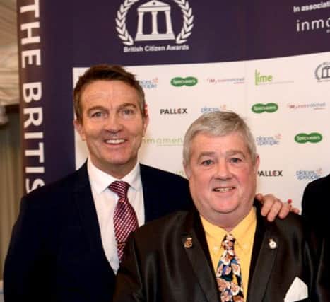Les Heyhoe (right) poses with TV presenter Bradley Walsh (left) after being awarded with his BCAv at the British Citizen Awards in London.