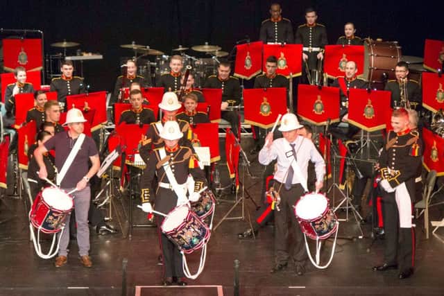 Children from Medina Primary School Portsmouth with musicians from the Royal Marines School of Music