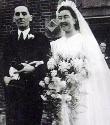 Harry and Queenie at their wedding outside St Philips Church, Highbury, Cosham