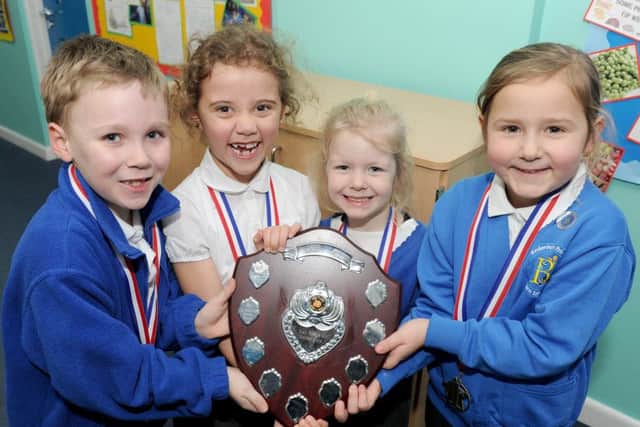 Bedenham Primary School in Gosport, held their annual Fareham and Gosport maths school quiz.  Pictured is: Key Stage 1 maths quiz winners from Bedenham Primary School (l-r) Mathew Hayward (7), Maddie Stevens (6), Ivy Caddick (5) and Olivia Thomson (6).   Picture: Sarah Standing