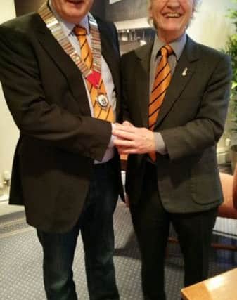 Trevor Slydell (left) with Brian Smith, who is taking over as chairman of the HIBC