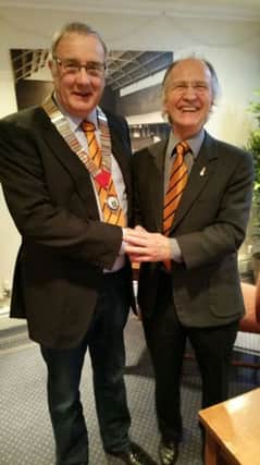 Trevor Slydell (left) with Brian Smith, who is taking over as chairman of the HIBC