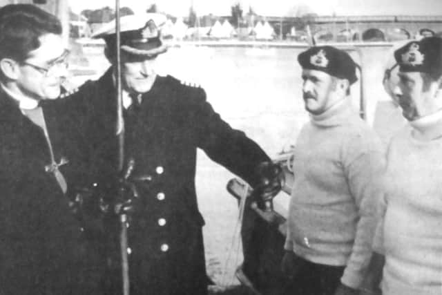 The Queens harbourmaster, Captain Chris Chamberlen, escorts the new Bishop of Portsmouth, the Rt Rev Timothy Bavin to the launch, to take him from Lower Quay in Fareham to Portsmouth (5985-1-2)