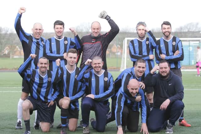 The dads and coaches from Fleur De Lys