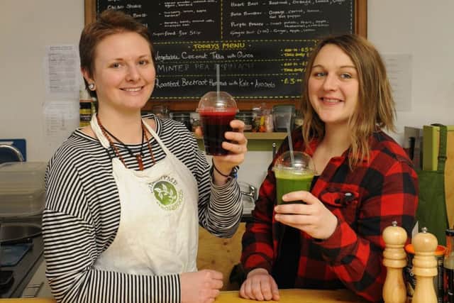 Lianne Hickman and Kelly Kemp, directors of Wild Thyme Wholefoods, enjoy a Heart Beet and a Vital Green   Picture: Malcolm Wells