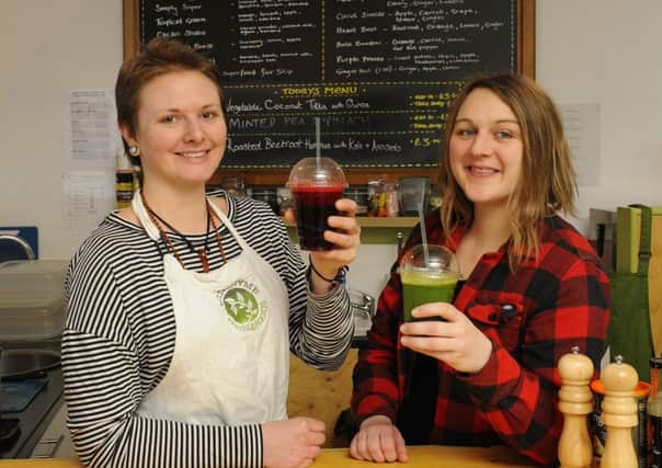 Lianne Hickman and Kelly Kemp, directors of Wild Thyme Wholefoods, enjoy a Heart Beet and a Vital Green   Picture: Malcolm Wells