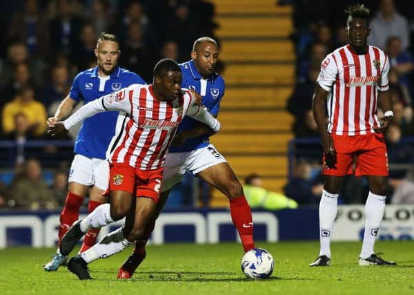 Rommy Boco in action for Pompey before moving to Accrington last season