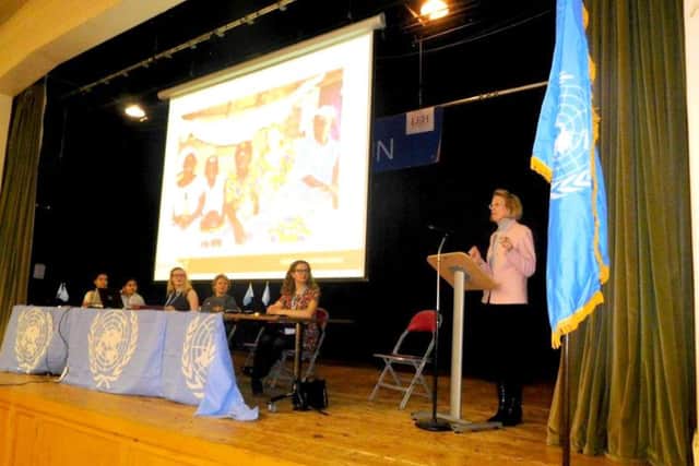 Sue Tinney, right, delivering her keynote speech at the Model UN Conference