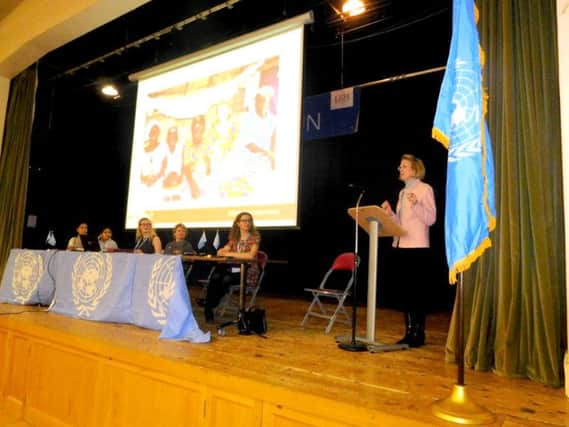 Sue Tinney, right, delivering her keynote speech at the Model UN Conference