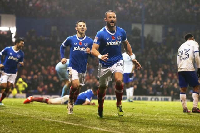 Noel Hunt celebrates his first - and so far only - goal for Pompey in their 4-0 win over Mansfield in November   Picture: Joe Pepler