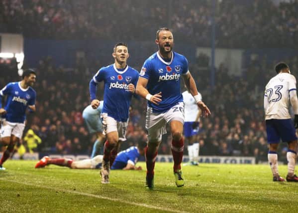 Noel Hunt celebrates his first - and so far only - goal for Pompey in their 4-0 win over Mansfield in November   Picture: Joe Pepler
