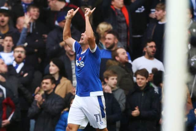 Gary Roberts celebrates scoring earlier this season to ignite scenes of joy among the Fratton faithful
