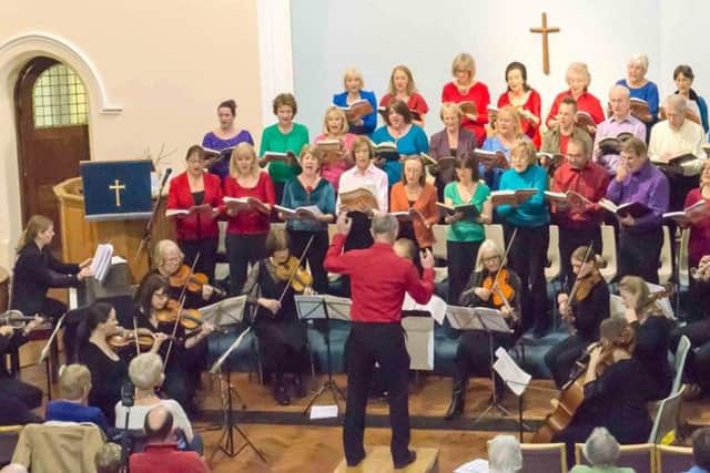 The choir is working hard to prepare for the concert