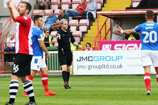 Gavin Ward awarded Pompey a controversial late penalty in their 1-0 win at Exeter earlier this season    Picture: Joe Pepler