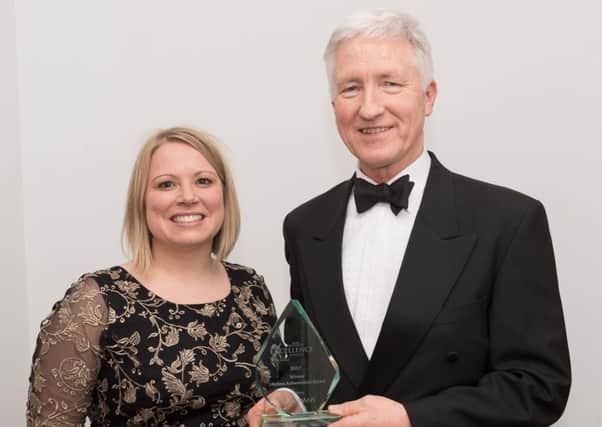 Lifetime Achievement winner Martin Putman with Lucy Grey of lead sponsor Trethowans Picture: Keith Woodland