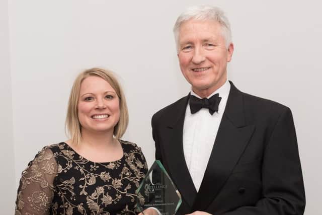 Lifetime Achievement winner Martin Putman with Lucy Grey of lead sponsor Trethowans  Picture: Keith Woodland