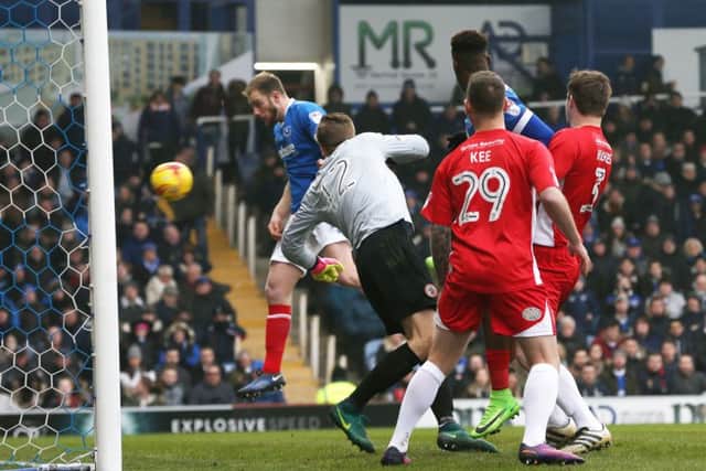 Matt Clarke heads Pompey in front after just 75 seconds as the Blues beat Accrington Stanley 2-0 at Fratton Park Picture: Joe Pepler