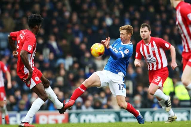Eoin Doyle battles for the ball during Pompey's 2-0 win over Accrington at Fratton Park   Picture: Joe Pepler