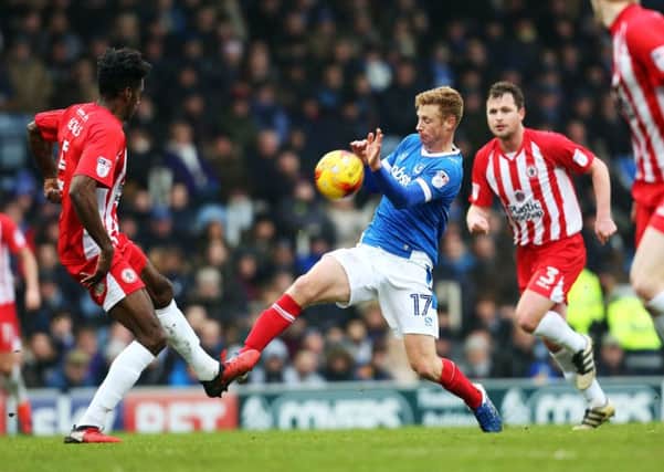 Eoin Doyle battles for the ball during Pompey's 2-0 win over Accrington at Fratton Park   Picture: Joe Pepler
