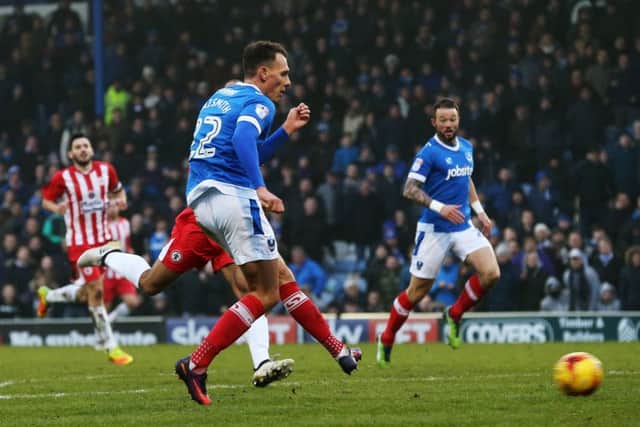 Second-half substitute Kal Naismith puts the seal on Pompeys victory over Accrington Stanley, scoring in added-time to wrap up a hard-fought 2-0 win over his former club                Picture: Joe Pepler