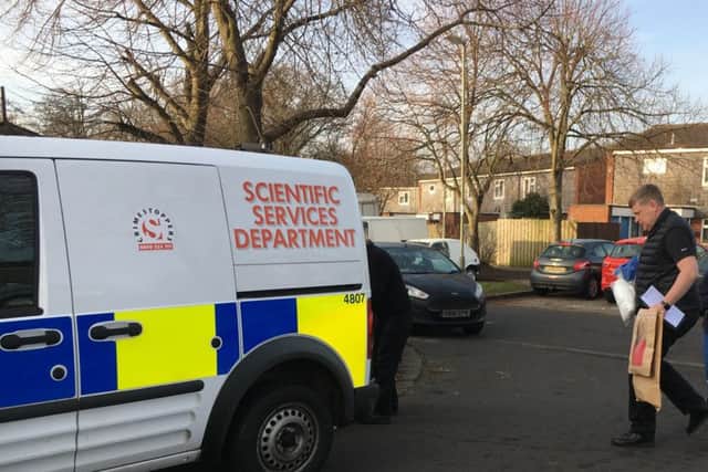 Police in Athena Avenue today. Picture: Ben Fishwick